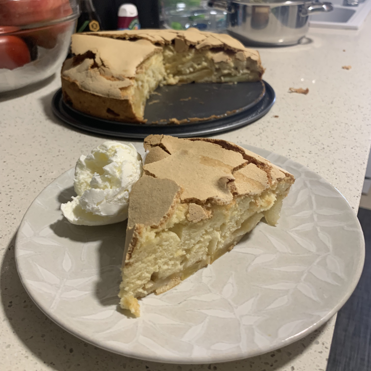 Apple charlotte with ice cream next to it